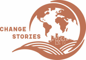 Change Stories project logo depicts a sideways quote mark. In the center of the quote are images of a city in hills with a map of the world on top.