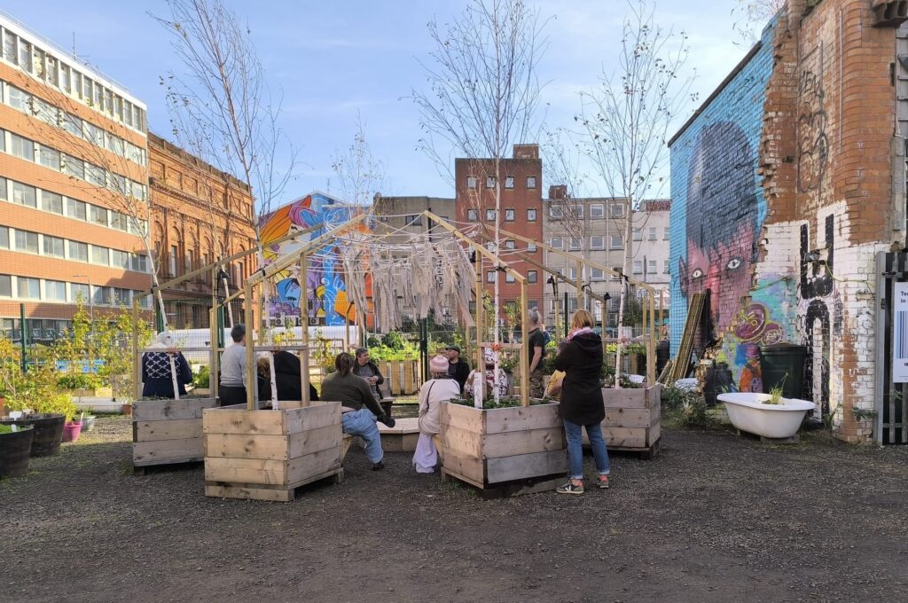 A group of artists and activists coming together in the city centre to turn an abandoned space into a community garden.